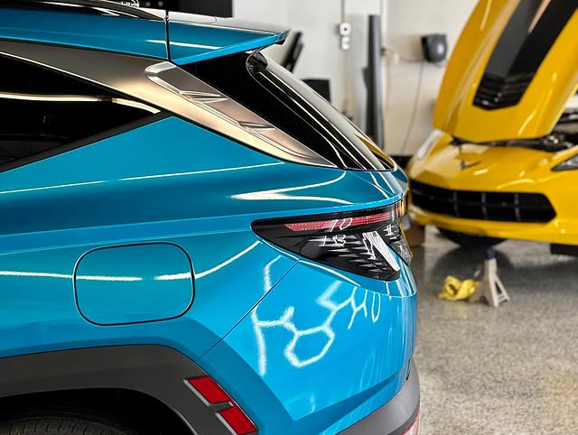 Close-up of a clean, high-gloss finish after work in the Midwest Auto Pros bay